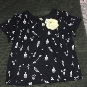 Black top with white designs